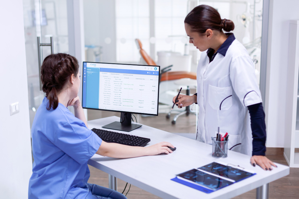 doctor using digital tablet clinic reception